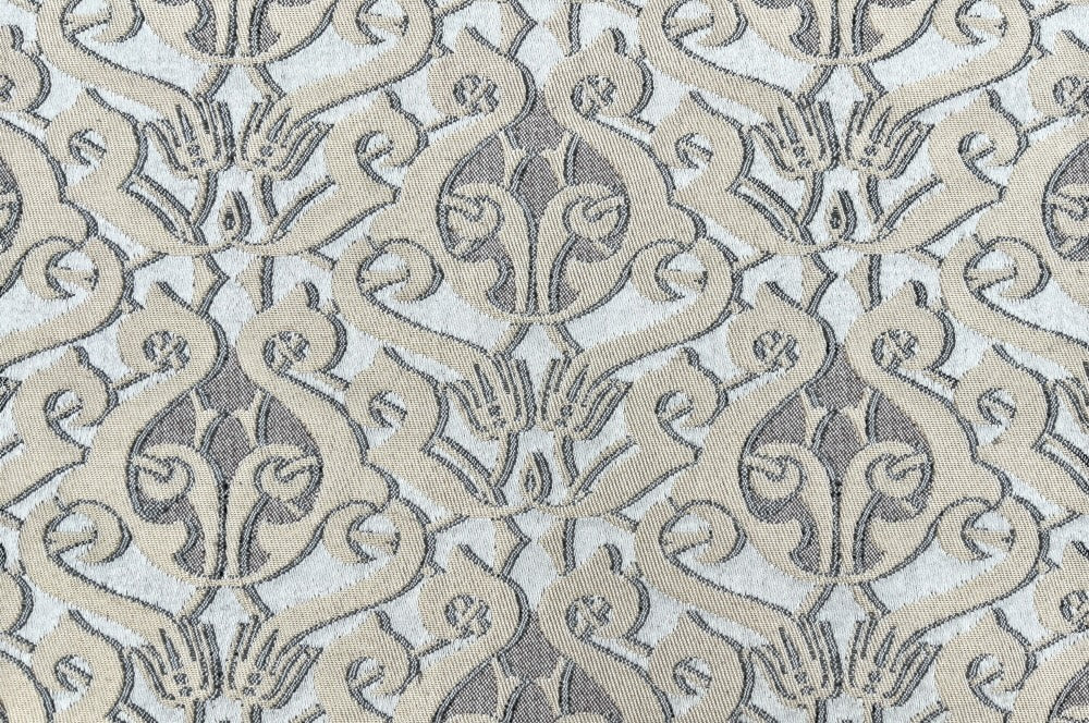 Kissenhülle dulce, mit goldfarbien Ornament. Ansicht Detail