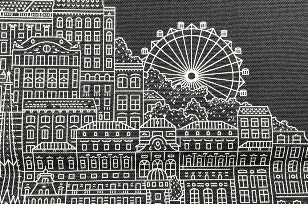 Die "Vienna Shopper" ist eine Tasche aus weicher, biologischer Baumwolle. Sie zeigt einen Aufdruck von Wien’s markanten Häusersilhouetten. Detailansicht - scharz mit weißem Aufdruck