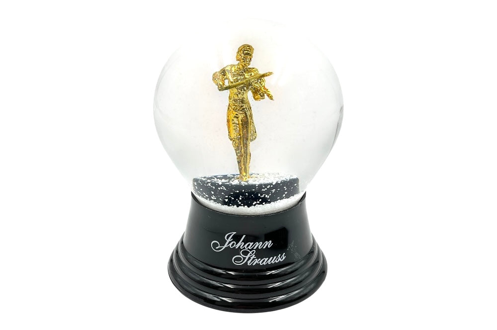 Diese handgefertigte Schneekugel zeigt Johann Strauss in goldener Pracht beim Geigenspiel. Ein edles Sammlerstück aus der ORIGINAL WIENER SCHNEEKUGEL MANUFAKTUR!