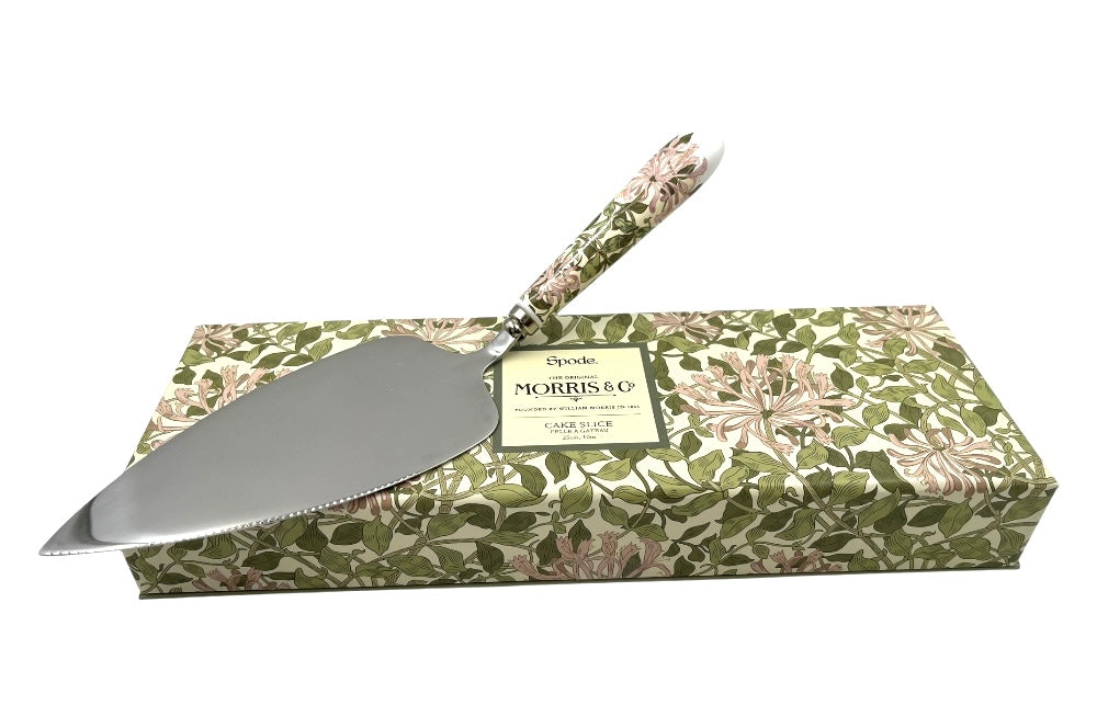 Tortenheber, der Griff ist mit einem Design von William Morris gestaltet. Ansicht auf der Geschenkverpackung liegenk