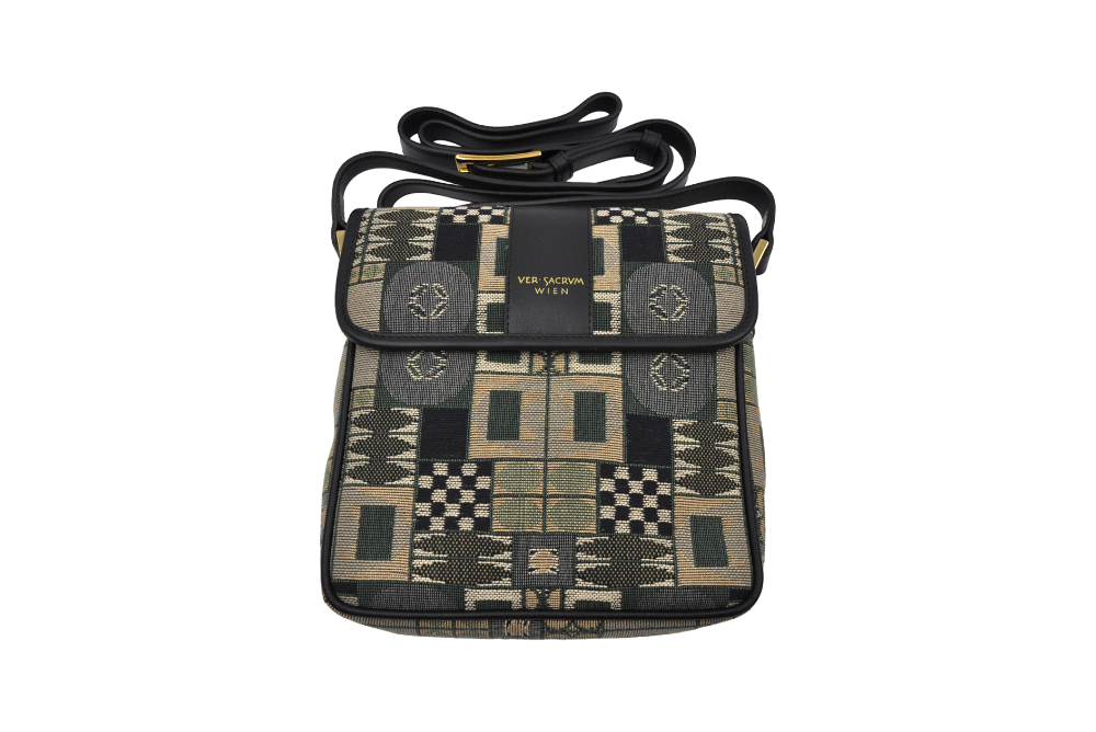 grüne versacrum tasdche mit gefalteten tragegurt